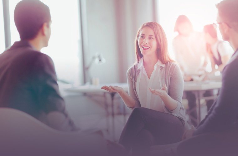 PhD Students talking during meeting together in a studio